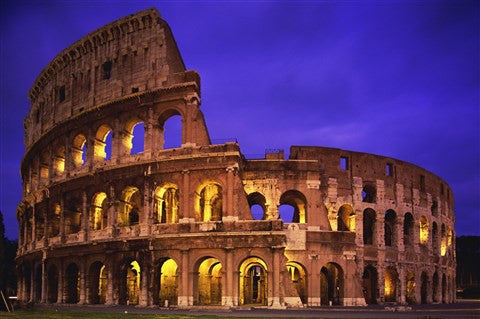 Low angle view of a coliseum lit up at night, Colosseum, Rome, Italy