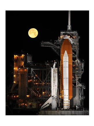 Space Shuttle Discovery under a Full Moon